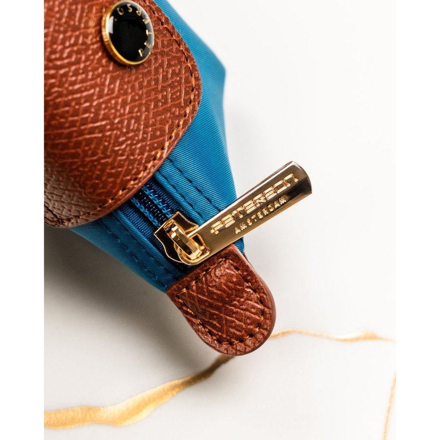 Etui na klucze wykonane z poliestru i skóry ekologicznej w turkusowym kolorze - Peterson