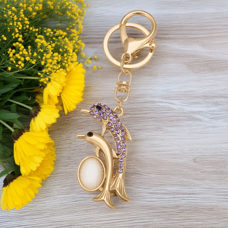 Breloczek Delfiny z kryształkami i dedykacją na tabliczce