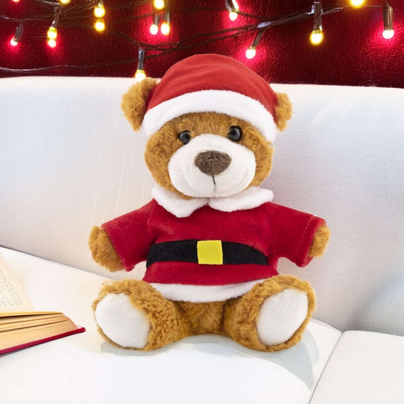 Pluszowy miś w stroju Świętego Mikołaja na Mikołajki i Święta