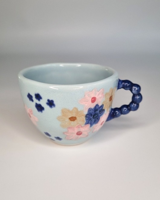 Image of Pakamera Filiżanka ceramiczna KWIATY