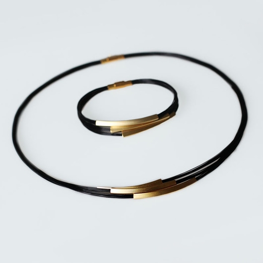Image of Pakamera Komplet Gold in Black