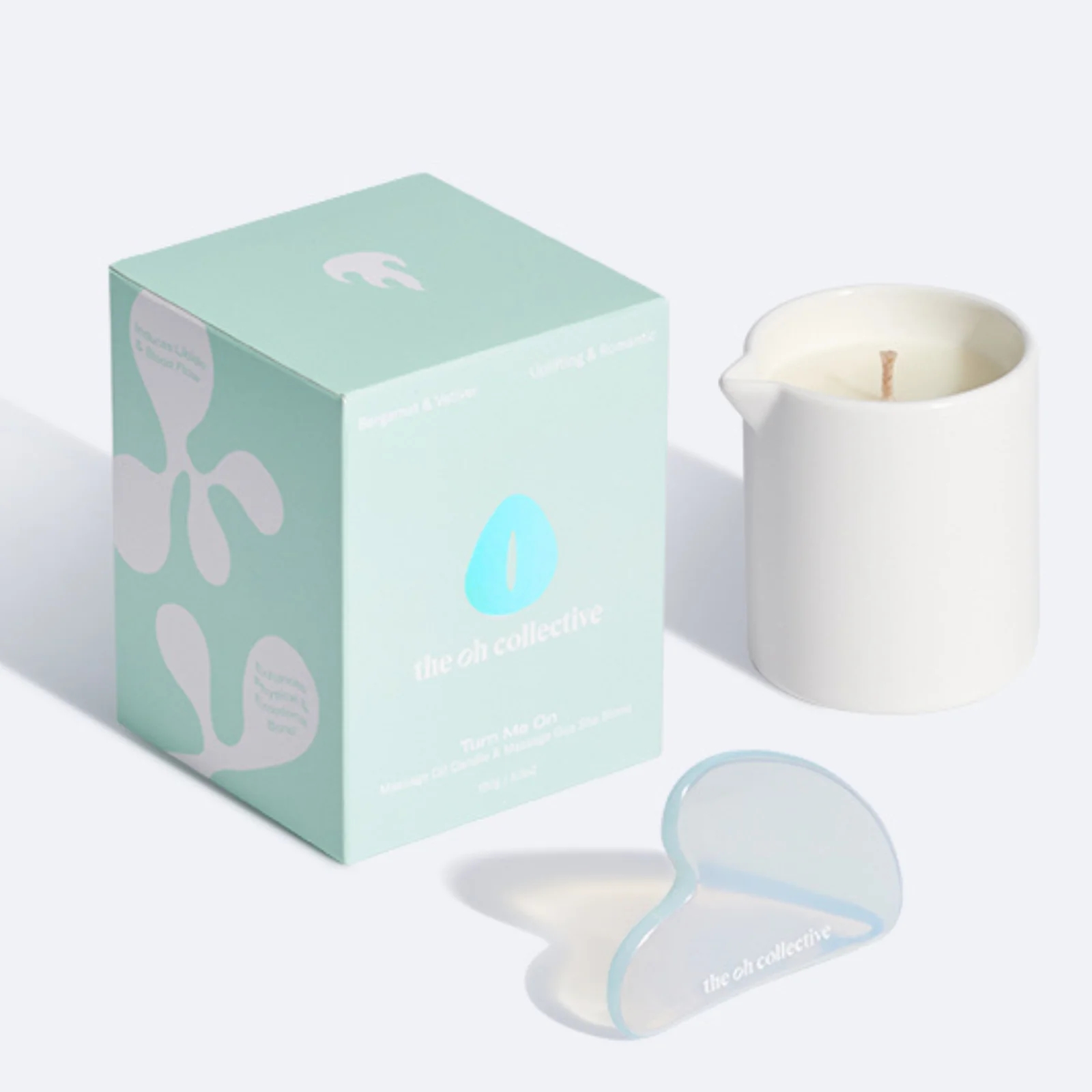 Zestaw świeca do masażu + kamień Gua Sha The Oh Collective Turn Me On