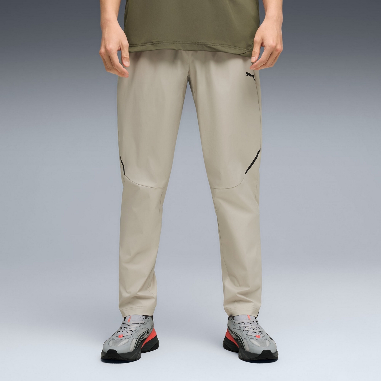 Spodnie dresowe męskie Puma PUMATECH WOVEN OP beżowe 63442061