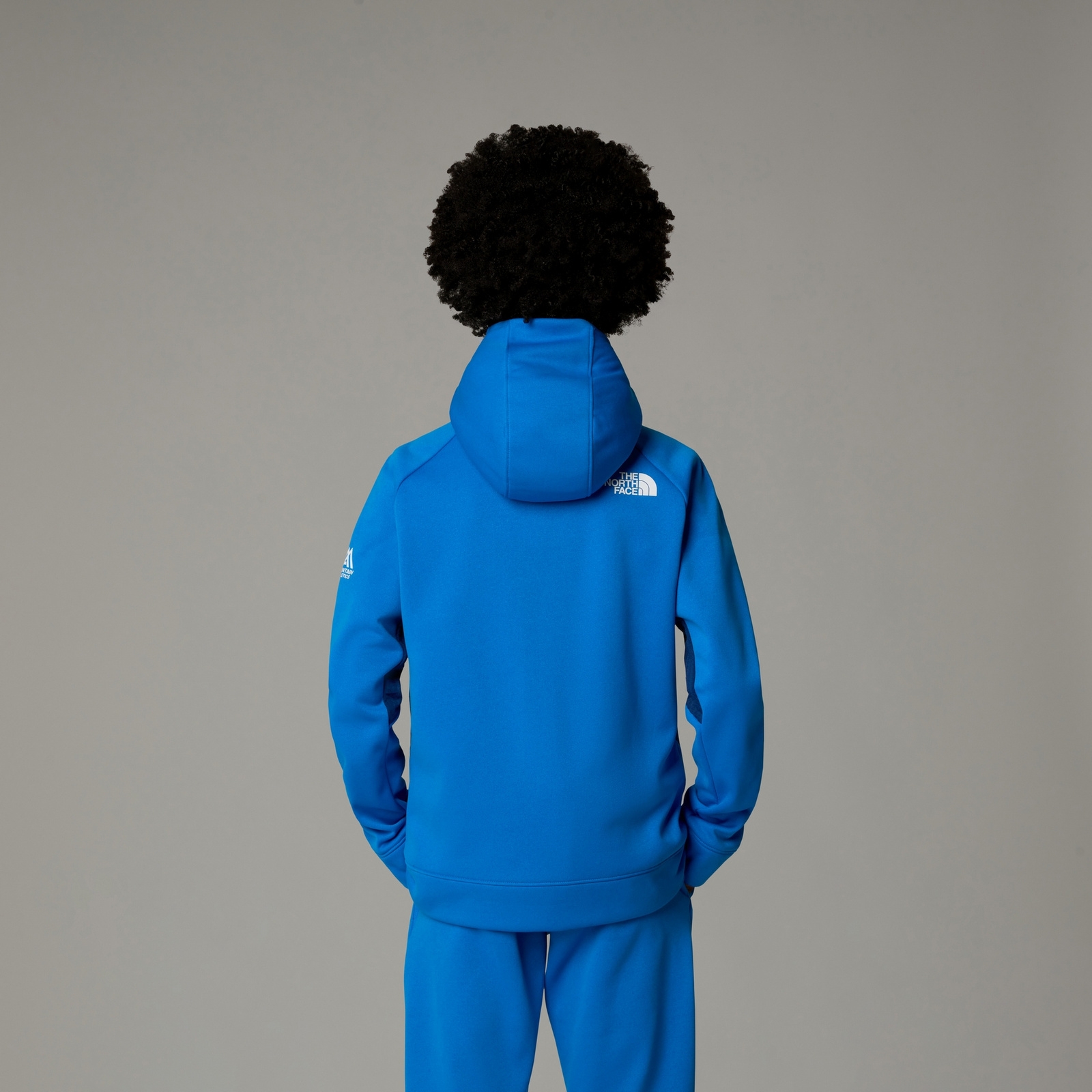 Kurtka z kapturem chopica The North Face MOUNTAIN ATHLETICS niebieska NF0A89HZT4S
