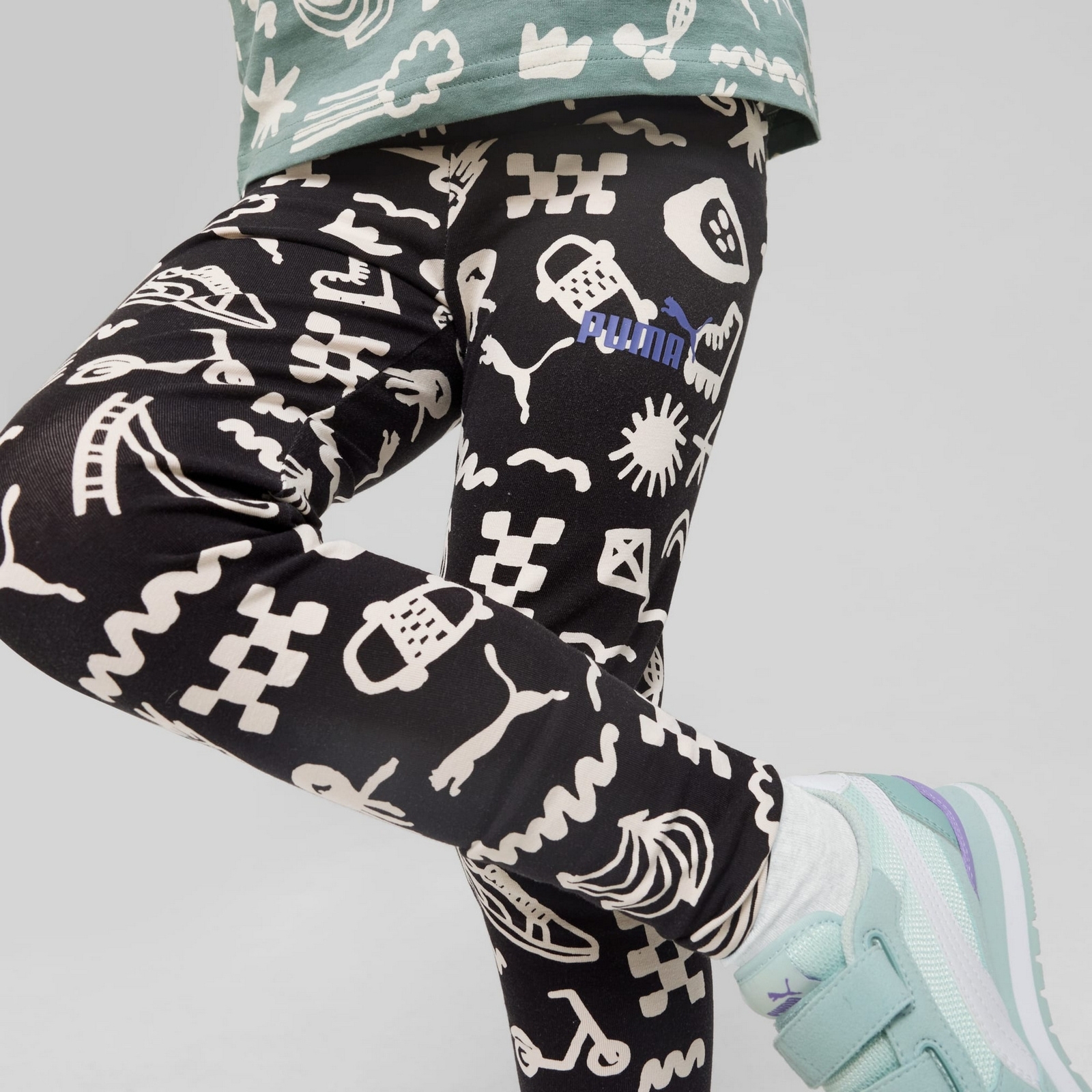 Legginsy dziewcz�ce Puma SANDY ADVENTURES AOP PS czarne 68516001