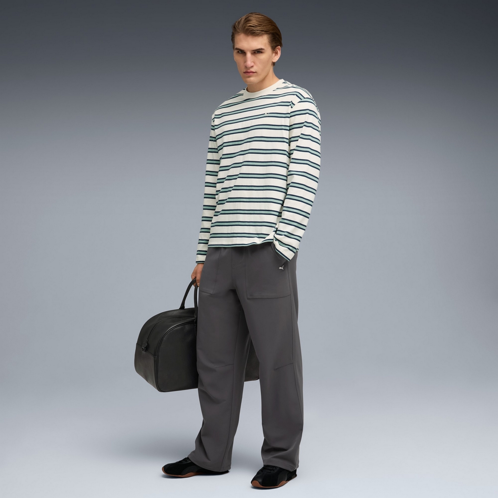 Spodnie dresowe męskie Puma MMQ WOVEN szare 63231344