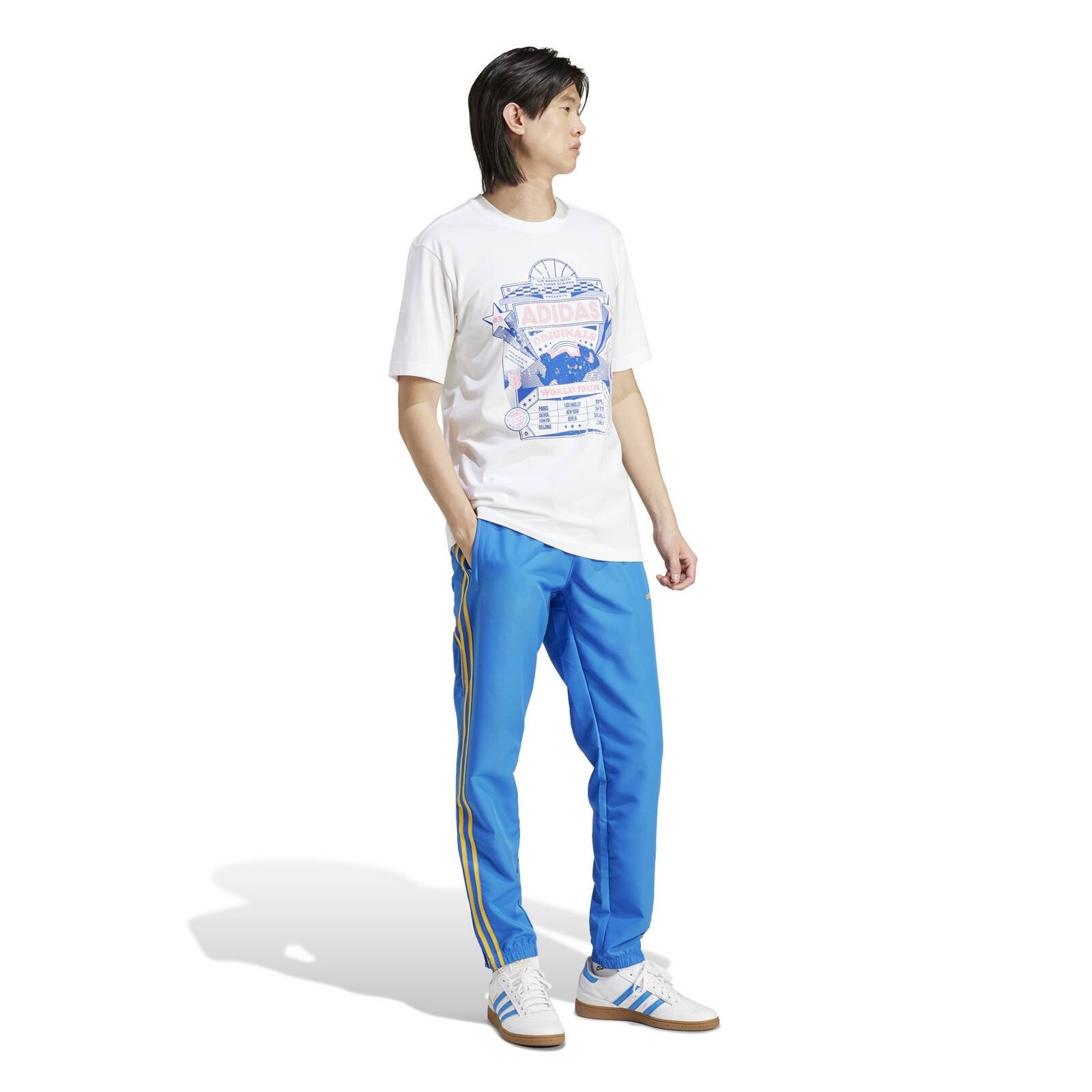 Spodnie dresowe mskie adidas WOVEN niebieskie IW3234