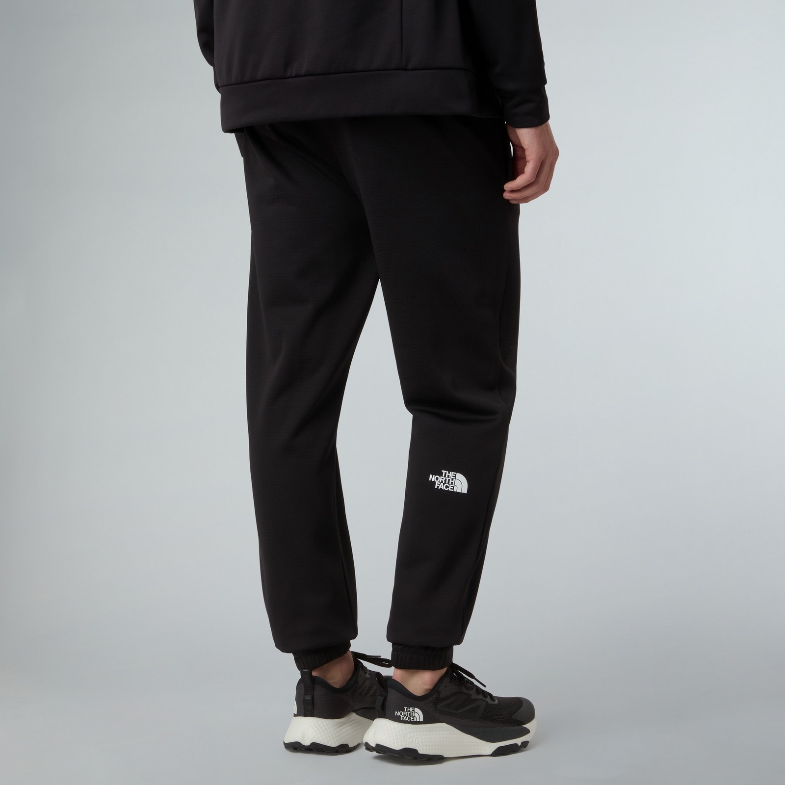 Spodnie dresowe mskie The North Face REAXION 2.0 czarne NF0A8DRSKS7