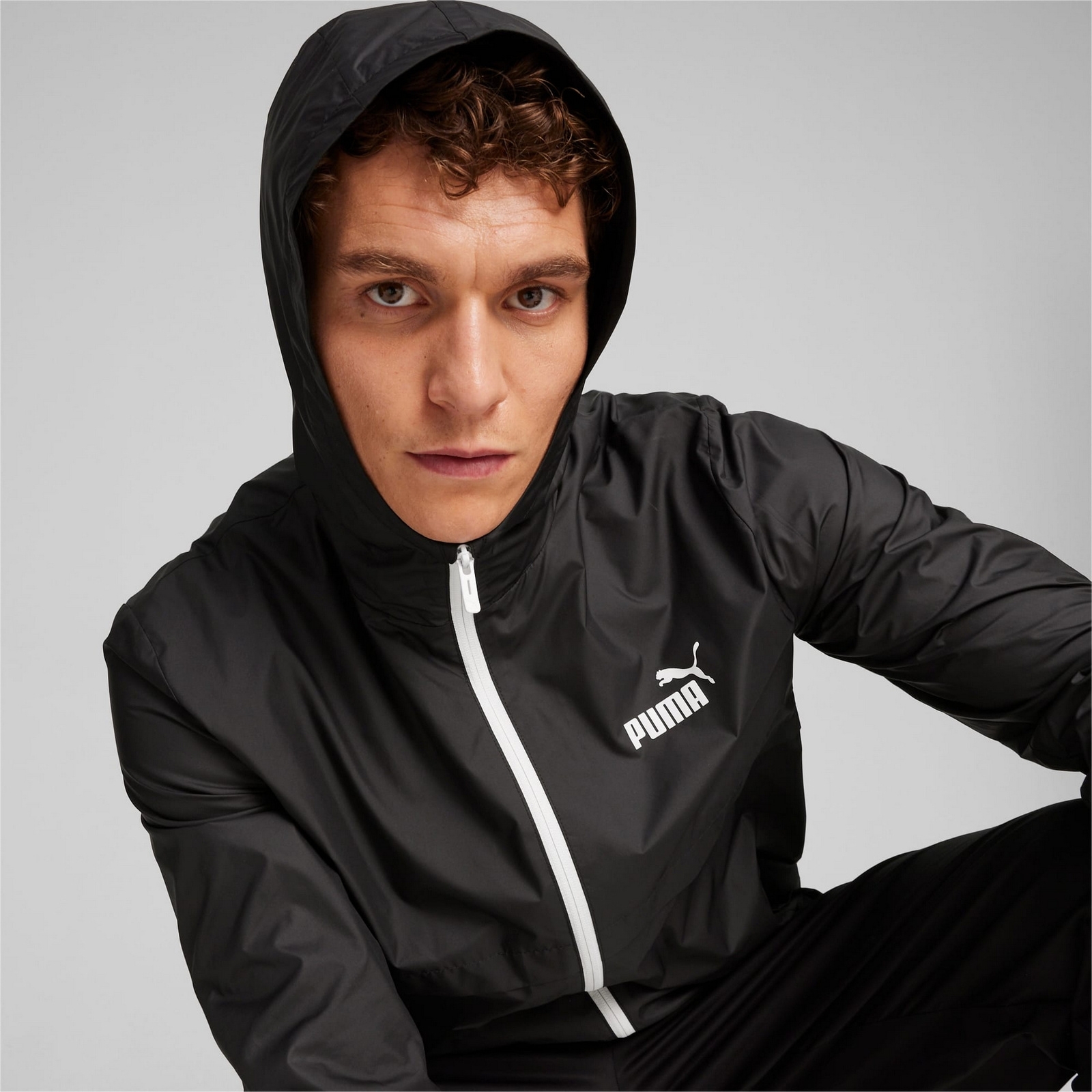 Kurtka z kapturem mska Puma ESS SOLID WINDBREAKER czarna 84748452