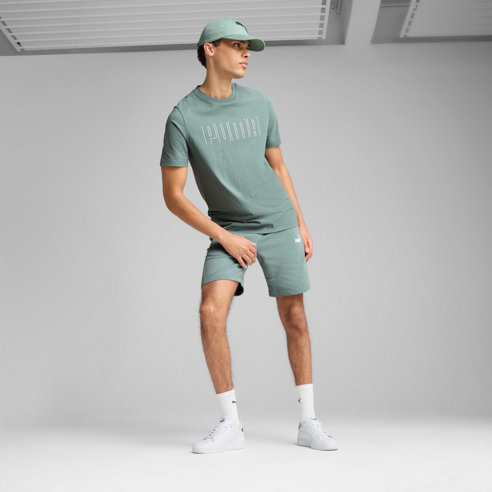 Spodenki m�skie Puma SPORT GRAPHIC 9" TR zielone 68462330