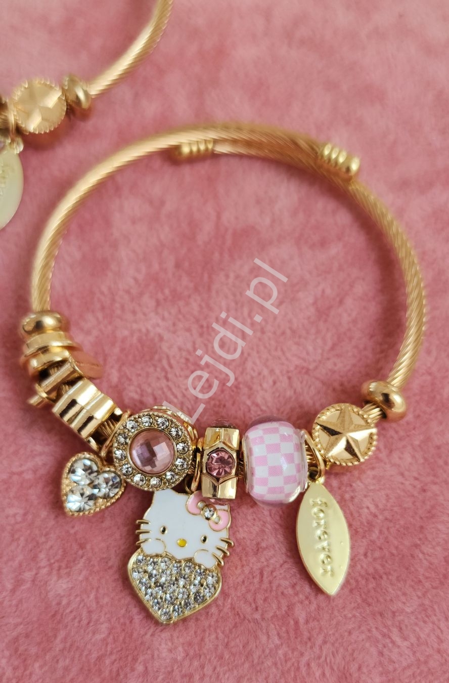 Bransoletka Hello Kitty w kolorze złotym z kotkiem i motylkiem