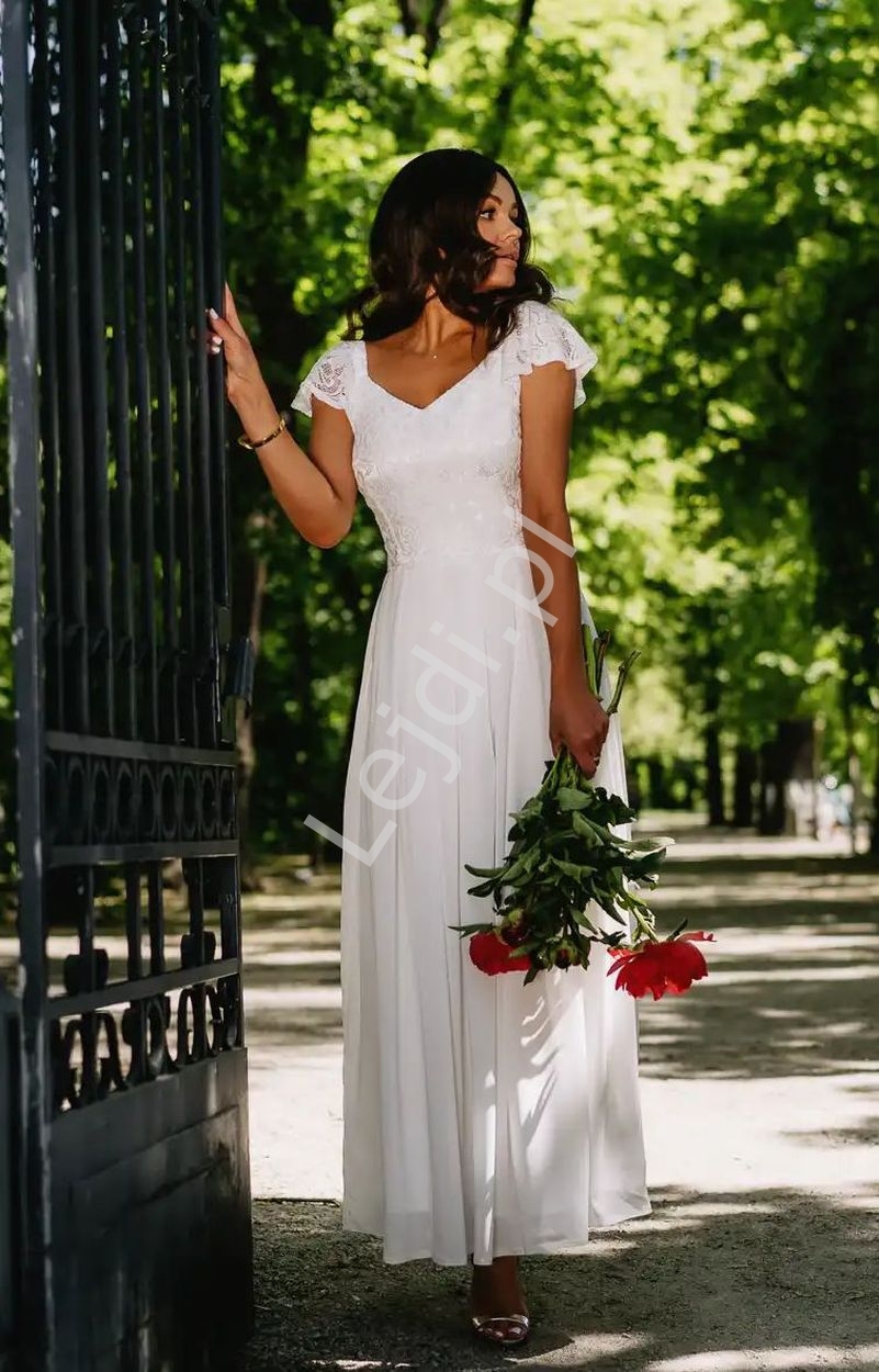 Image of Biało kremowa sukienka ślubna w romantycznym stylu Nela KM351