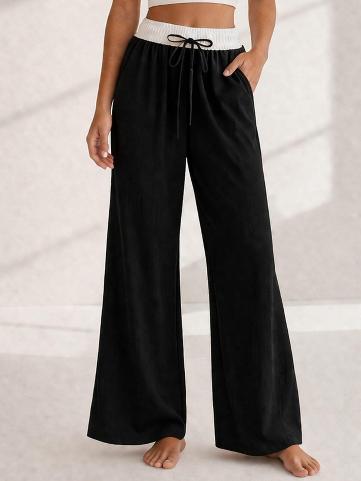 Spodnie materiałowe z kieszeniami