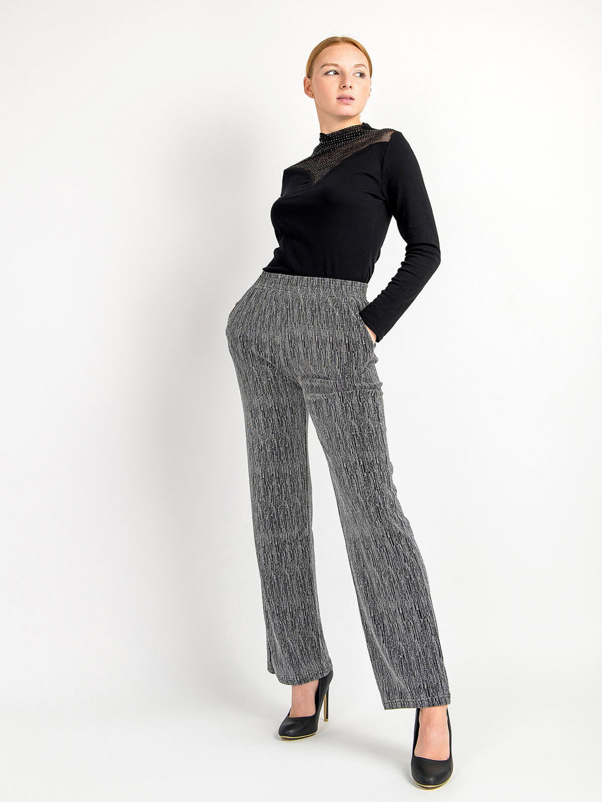 Błyszczące spodnie