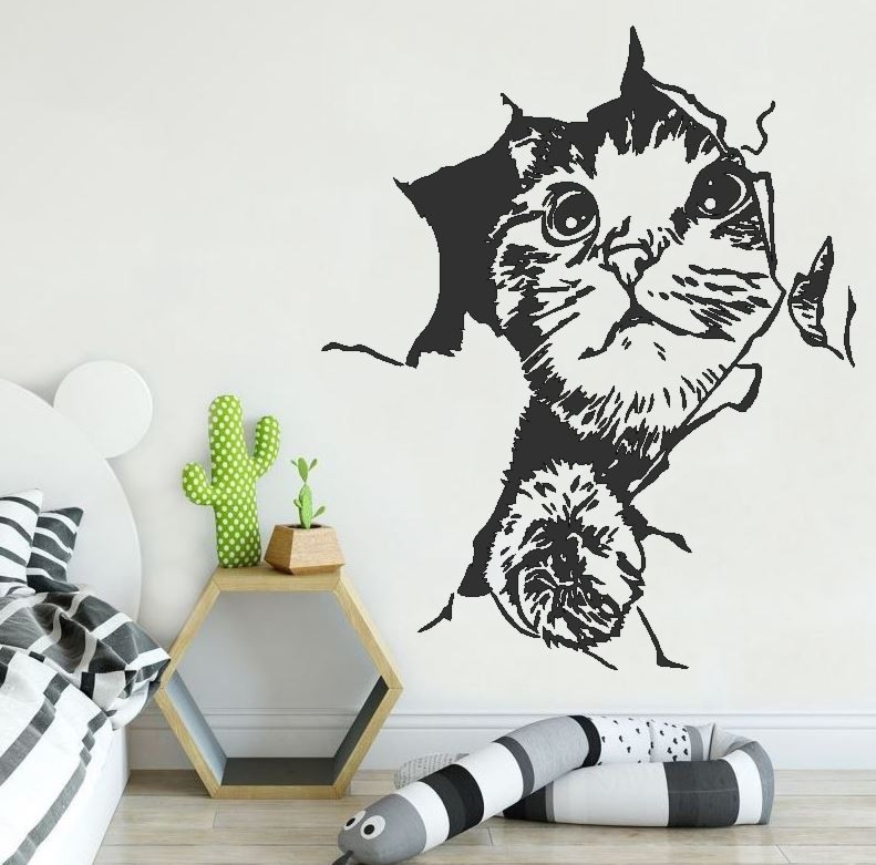 Naklejka kot wychodzący ze ściany