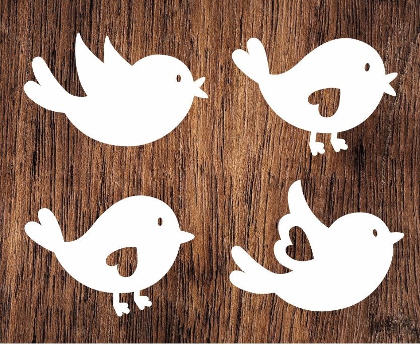 Zestaw czterech ptaszków z kartonu