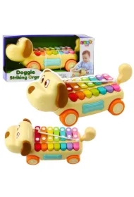 Piesek jeżdżący z cymbałkami