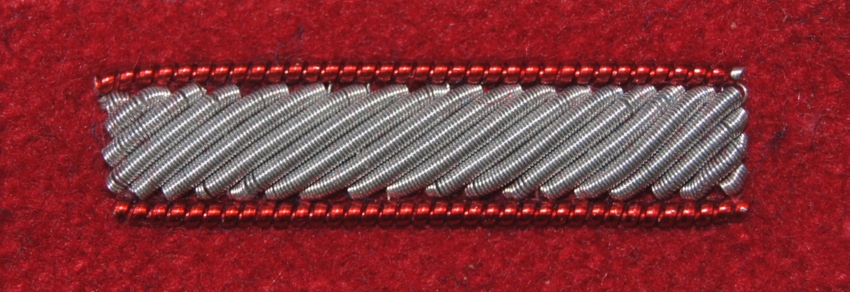 Stopień Wojska Polskiego haftowany bajorkiem do beretu szkarłatnego - starszy szeregowy specjalista